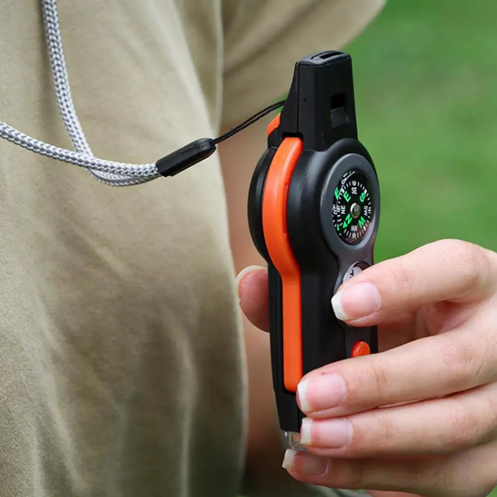 7-in-1 Outdoor Survival Whistle with LED & Compass for Hiking